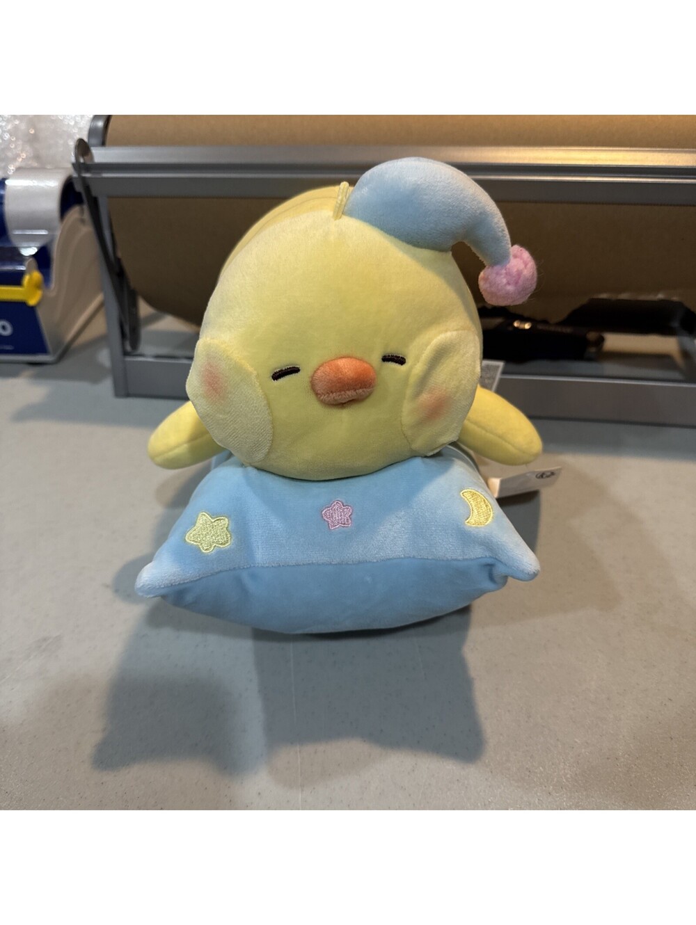 Miniso Life X Bibi Chicken Napping In A Pajama Hat Laying On A Pillow 10”